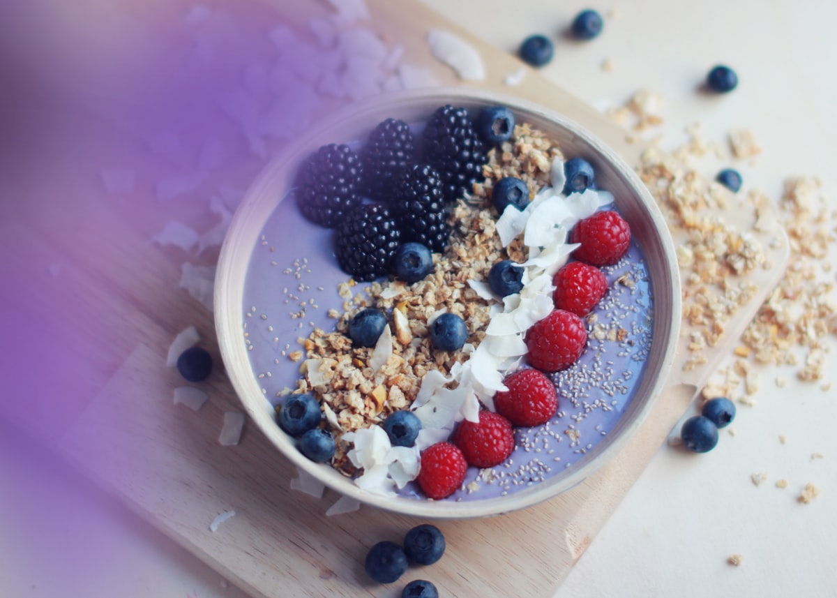 Purple smoothie bowl with berries